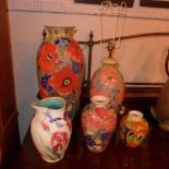 Three Moorcroft style vases a similar table lamp and a water jug