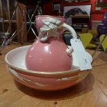 A Davenport porcelain jug and basin glazed pink and white heightened in gilt