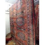 A fine old North East Persian Turkoman carpet 275 X 140 cm repeating elephant foot motifs on a