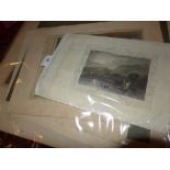 A collection of various unframed etchings and engravings
