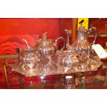 A Sheffield silver plate four piece tea service and a Mappin and Webb silver plated tray