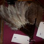 A vintage ostrich feather fan with faux tortoiseshell detail (A/F)