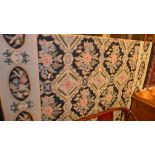 A William Morris style Aubusson needle point tapestry decorated with flowers