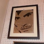 An Andy Worhol lithograph on metallic paper glazed and framed