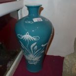 A Chinese baluster form vase glazed turquoise and decorated with birds