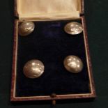 A set of four buttons from American Indian Head nickles in velour lined box circa 1910