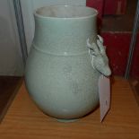 A Chinese celadon crackle glazed vase with stag form handles