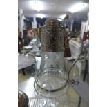 A silver plated embossed claret jug