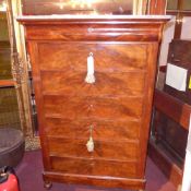 A C19th French figured walnut tall chest the marble top above frieze drawers and six further drawers