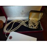 A Mikimoto cultured pearl necklace and a