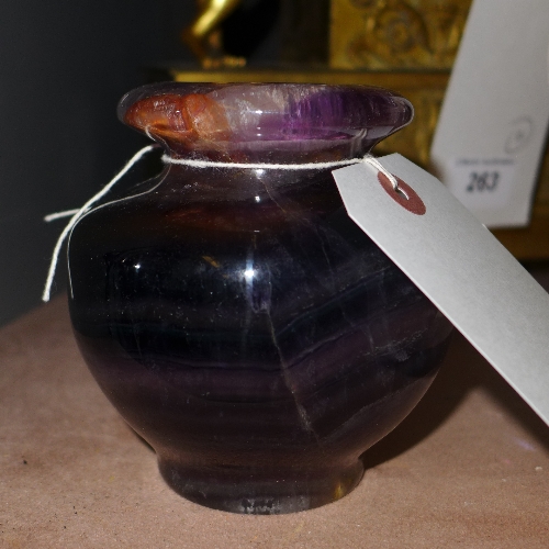 A blue John style squat form vase