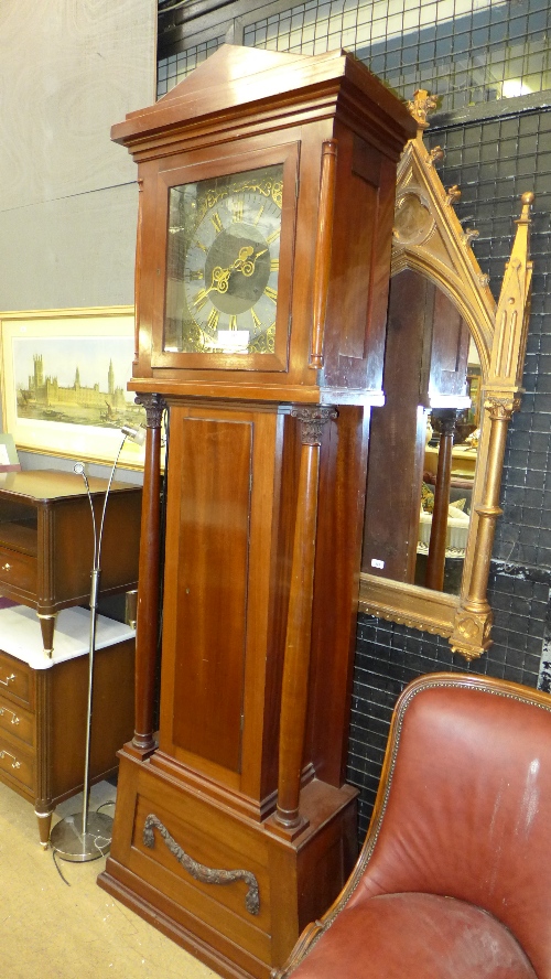 A large mahogany longcase clock with brass Roman numeral dial and carved swag relief W 67 D 34 H 250