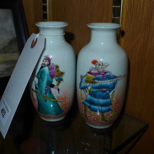 A pair of hand painted miniature Chinese