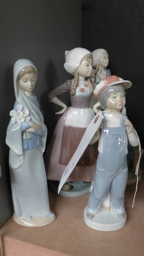 A collection of Lladro figures