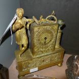 A Regency ormolu mantle clock with figure and Masonic relief (no movement)