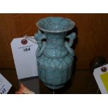 A small Chinese style crackle glaze vase