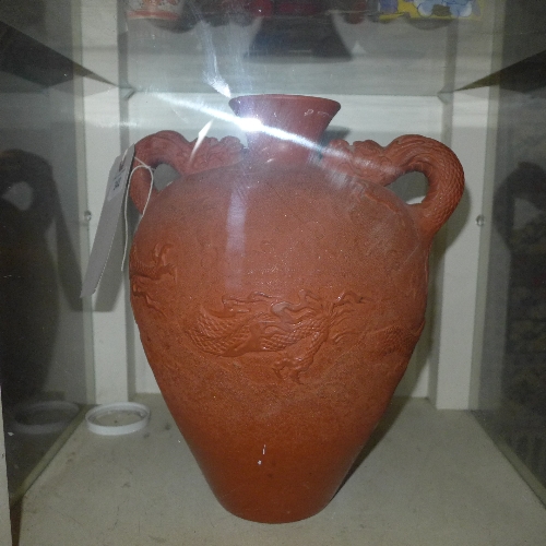 A terracotta Chinese style vase with dra