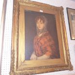 A print portrait of a girl in a gilt frame