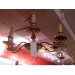 A brass six branch hanging chandelier