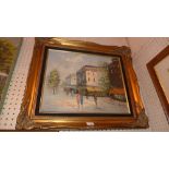 A Continental oil on canvas street scene within carved giltwood frame