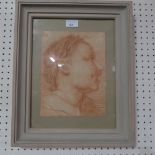 A C19th chalk portrait of a boy signed indistinctly bottom left glazed and framed