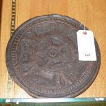 A late C17th oak carved cheese mould with Tudor rose detail