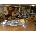 A collection of silver plate including candelabra, tray, coasters and others