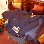 A collection of airline pilots uniforms
