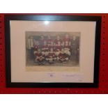 A glazed and framed coloured print of the Woolwich Arsenal team