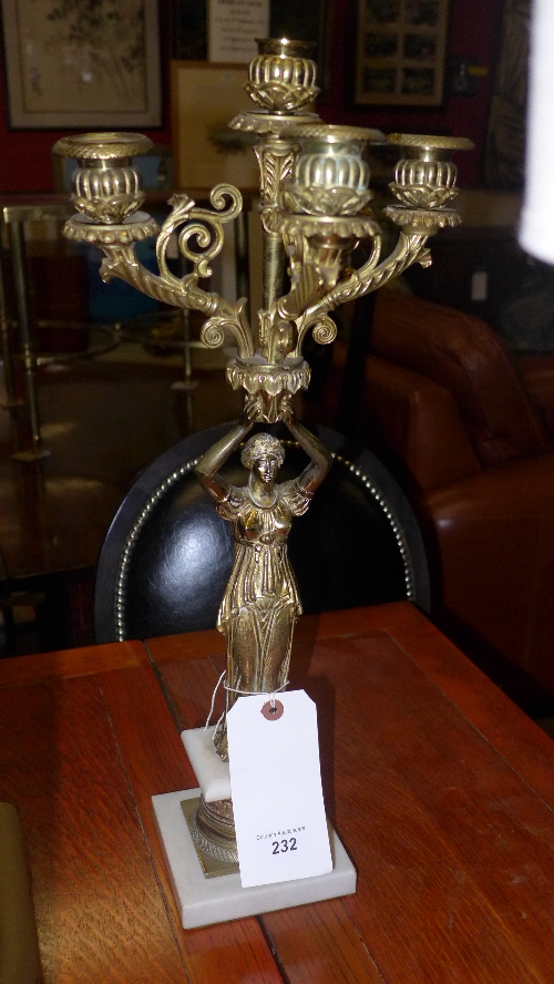 A pair of classical design brass and marble candelabra with maiden relief on marble base