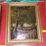 A C19th oil on canvas rural woodland pat