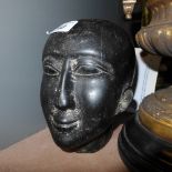 A carved stone head