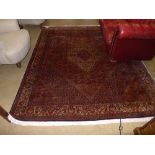 A hand knotted Persian carpet the red gr