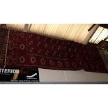 An extremely fine North-East Persian Turkoman carpets 345 cm x 205 cm repeating ghoul motifs on a