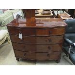 A George III figured mahogany bow fronted chest of two short over three long drawers with knob