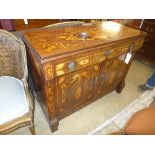 An early C19th Dutch marquetry side cabinet with frieze drawer above panel doors W 120 D 56 H 94 cm