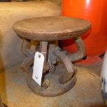 An Antique carved Thebes stool with interlinked column and incised base