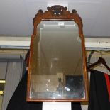 A George II design walnut pier mirror the bevelled plate and carved crest
