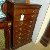 A Victorian mahogany Gothic revival tall chest having seven drawers on plinth base W 68 D 48 H 120