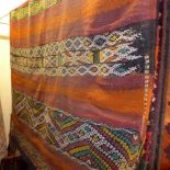 A Morrocan multicoloured flatweave rug