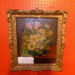 An oil on board still life study of flowers in a carved gilt frame