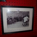 A framed photo of the first FA Cup Final between West Ham and Bolton 1923