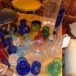 A collection of coloured glassware
