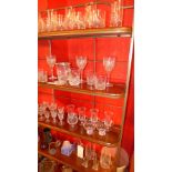 A large and varied collection of glassware items including sundae dishes tumblers and others