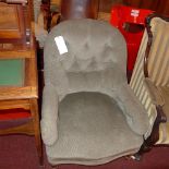 A Victorian mahogany chair upholstered in light blue buttoned velour