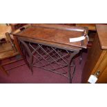 A pair of tray top wrought iron wine racks
