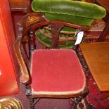 An Edwardian mahogany and line inlaid corner chair raised on turned supports