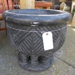 A pair of black marble garden planters