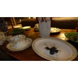 A miscellaneous collection including cabbage plates, dinner plates, Faience vase, Staffordshire