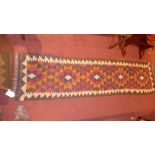 A Persian hand knotted Kelim runner with